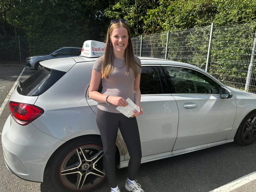 Happy learner after manual driving lessons with Excel Driving Tuition